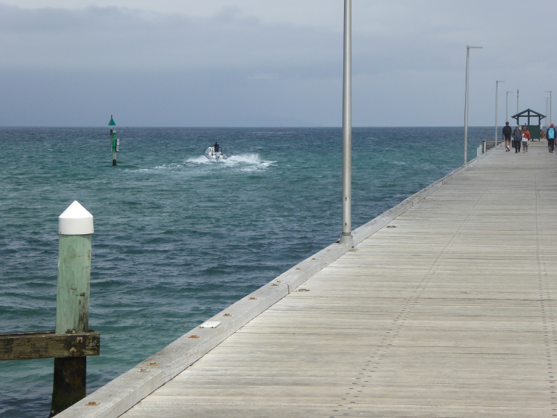 Busy with boats chugging past Mordialloc Pier